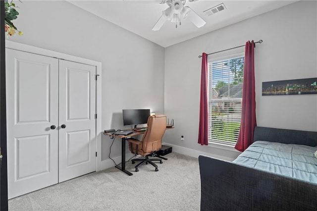 421 Tiger Ave, Covington, LA 70433 - bedroom featuring carpet flooring, baseboards, an office area, a ceiling fan, and a closet