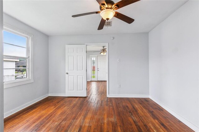 220002 Delille St, Chalmette, LA 70043 - spare room featuring ceiling fan, wood-type flooring, and baseboards