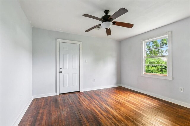 220002 Delille St, Chalmette, LA 70043 - spare room with hardwood / wood-style floors, baseboards, and a ceiling fan