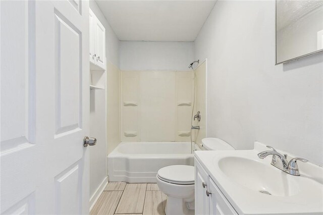 220002 Delille St, Chalmette, LA 70043 - bathroom featuring toilet, vanity, and washtub / shower combination