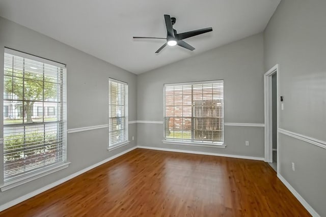 1550 De Battista Pl, New Orleans, LA 70131 - empty room featuring lofted ceiling, wood finished floors, plenty of natural light, ceiling fan, and baseboards