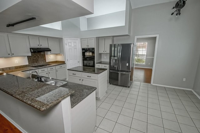 1550 De Battista Pl, New Orleans, LA 70131 - kitchen with black appliances, a sink, under cabinet range hood, baseboards, and backsplash