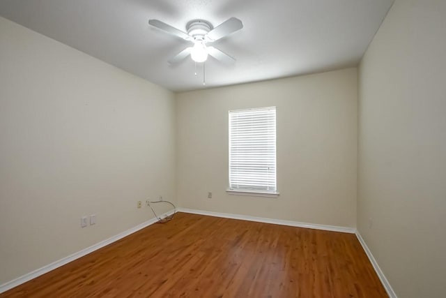 1550 De Battista Pl, New Orleans, LA 70131 - unfurnished room featuring baseboards, wood finished floors, and ceiling fan