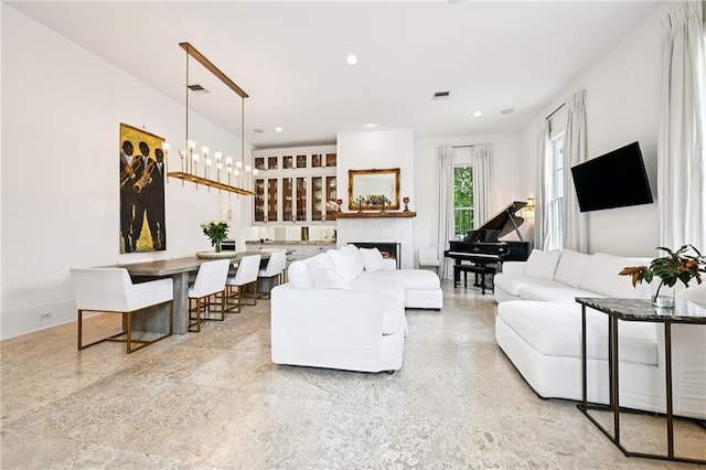 2538 N Rampart St, New Orleans, LA 70117 - living area with a fireplace and recessed lighting