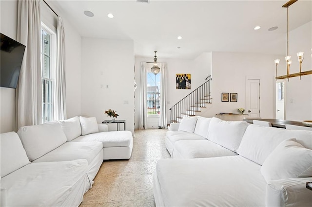 2538 N Rampart St, New Orleans, LA 70117 - living room featuring stairway and recessed lighting