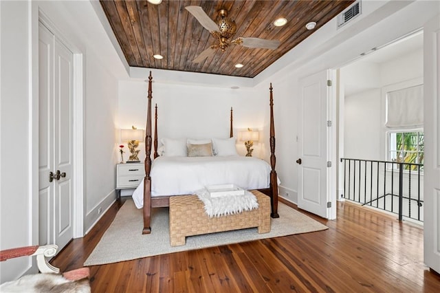 2538 N Rampart St, New Orleans, LA 70117 - bedroom with wood ceiling, dark wood-style flooring, and recessed lighting