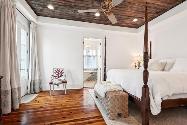 2538 N Rampart St, New Orleans, LA 70117 - bedroom with hardwood / wood-style flooring, multiple windows, wooden ceiling, ensuite bathroom, and recessed lighting