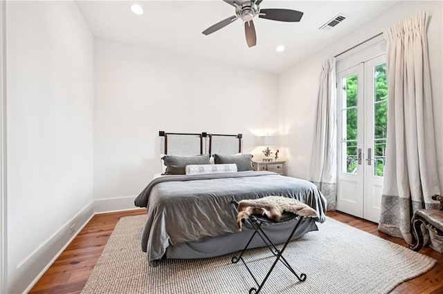 2538 N Rampart St, New Orleans, LA 70117 - bedroom with french doors, wood finished floors, recessed lighting, and a ceiling fan