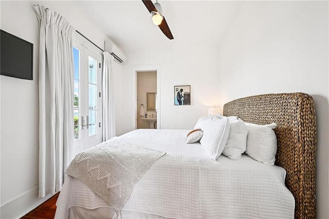 2538 N Rampart St, New Orleans, LA 70117 - bedroom with a wall mounted air conditioner, french doors, access to exterior, a ceiling fan, and ensuite bathroom