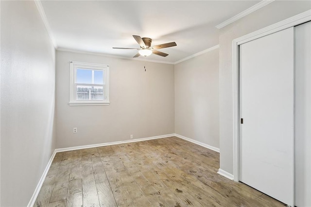 725 N Turnbull Dr, Metairie, LA 70001 - spare room featuring ornamental molding, ceiling fan, hardwood / wood-style flooring, and baseboards