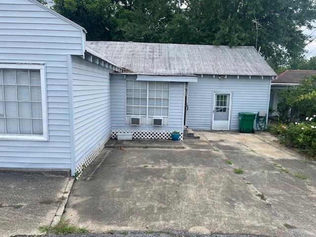 312 Central Ave, Reserve, LA 70084 - exterior space featuring metal roof and a patio area