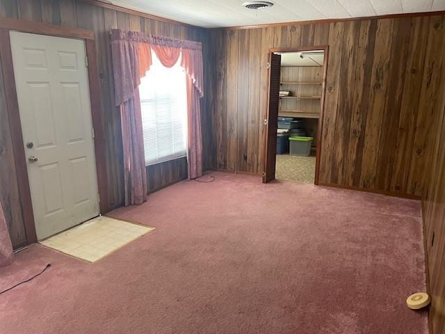 312 Central Ave, Reserve, LA 70084 - carpeted empty room featuring wood walls