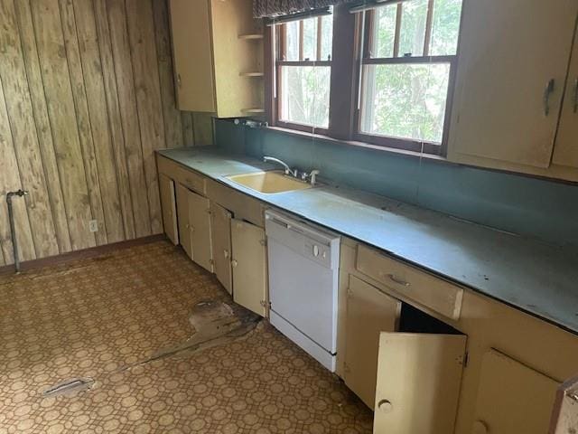 312 Central Ave, Reserve, LA 70084 - kitchen featuring dishwasher, wood walls, a sink, light countertops, and open shelves
