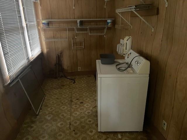 312 Central Ave, Reserve, LA 70084 - washroom with washer / dryer and wooden walls