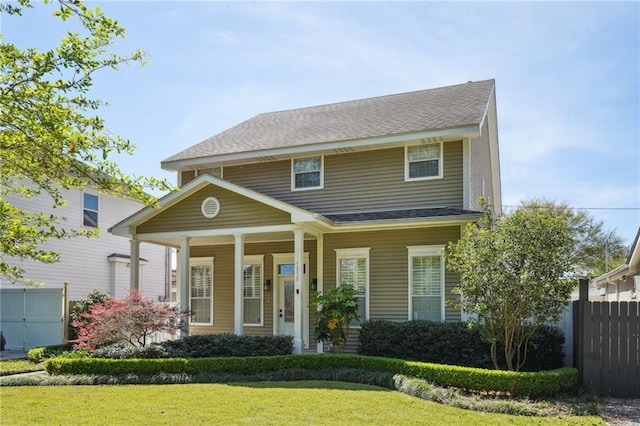 5830 Marshal Foch St, New Orleans, LA 70124 - view of front facade featuring roof with shingles and a porch
