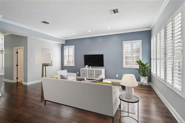 5830 Marshal Foch St, New Orleans, LA 70124 - living room with ornamental molding, dark wood finished floors, and recessed lighting