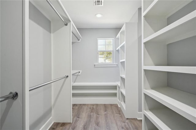 5830 Marshal Foch St, New Orleans, LA 70124 - spacious closet with wood finished floors