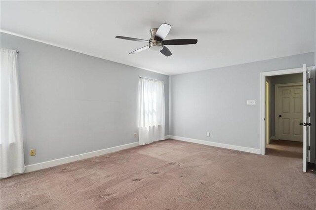 5830 Marshal Foch St, New Orleans, LA 70124 - carpeted spare room featuring ceiling fan and baseboards
