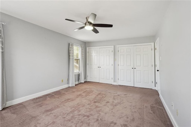 5830 Marshal Foch St, New Orleans, LA 70124 - unfurnished bedroom with multiple closets, carpet flooring, baseboards, and ceiling fan