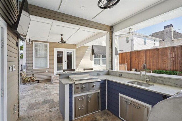 5830 Marshal Foch St, New Orleans, LA 70124 - view of patio with an outdoor kitchen and french doors