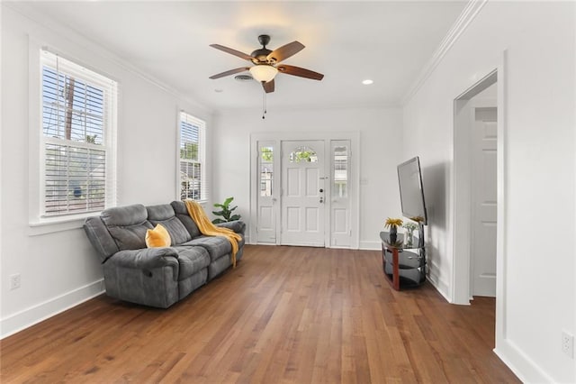 5124 Painters St, New Orleans, LA 70122 - foyer with hardwood / wood-style floors, ceiling fan, baseboards, and crown molding