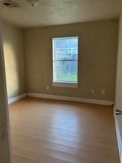 8830 Stroelitz St, New Orleans, LA 70118 - empty room featuring baseboards