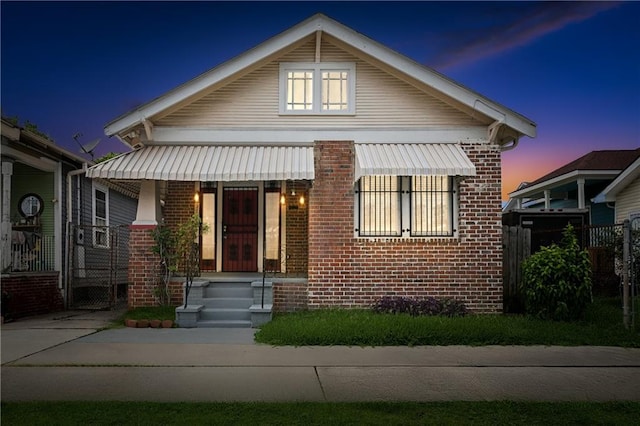 3717 S Johnson St, New Orleans, LA 70125 - bungalow-style house featuring brick siding