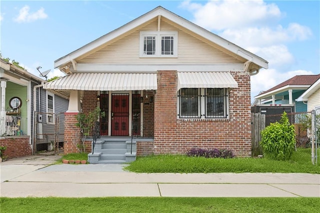 3717 S Johnson St, New Orleans, LA 70125 - bungalow-style house with brick siding