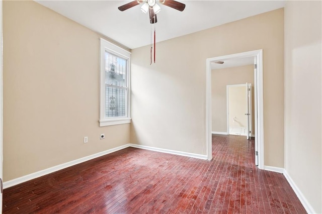 3717 S Johnson St, New Orleans, LA 70125 - spare room featuring a ceiling fan, hardwood / wood-style floors, and baseboards
