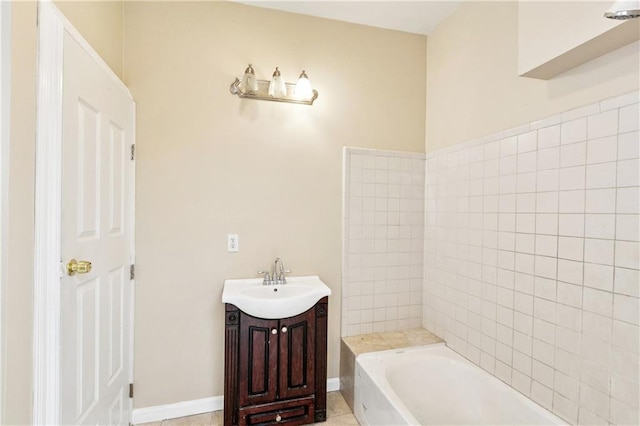 3717 S Johnson St, New Orleans, LA 70125 - full bathroom featuring a tub to relax in, vanity, and baseboards