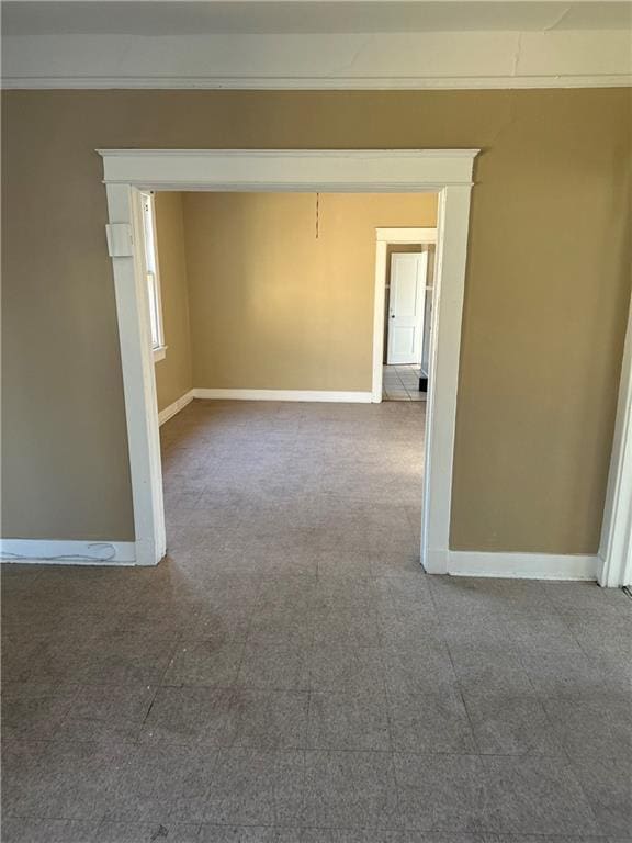 3526 Louisiana Ave Parkway, New Orleans, LA 70125 - empty room featuring baseboards and ornamental molding