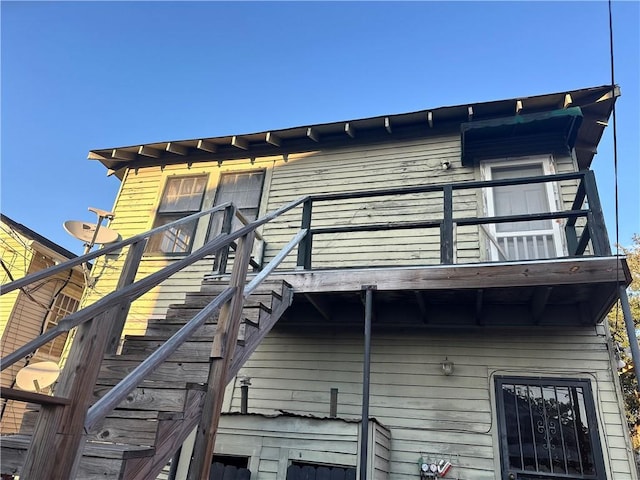 3526 Louisiana Ave Parkway, New Orleans, LA 70125 - view of side of home featuring stairs and a balcony