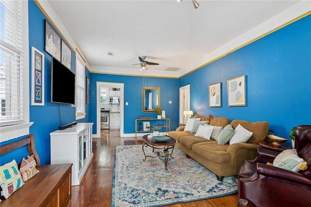 3221 N Rampart St Unit 3221, New Orleans, LA 70117 - living area featuring ceiling fan, wood finished floors, and baseboards