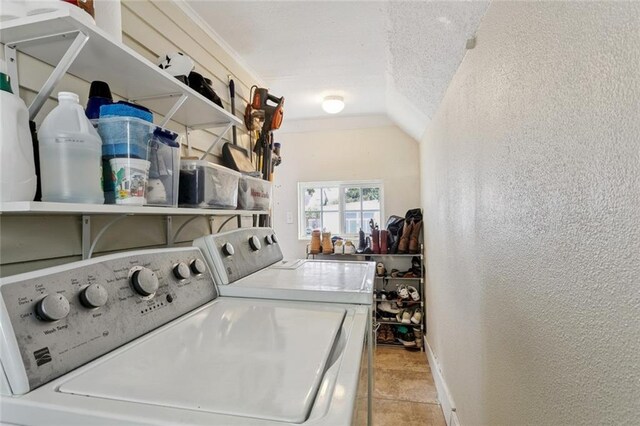 3221 N Rampart St Unit 3221, New Orleans, LA 70117 - laundry area with separate washer and dryer, a textured wall, and baseboards