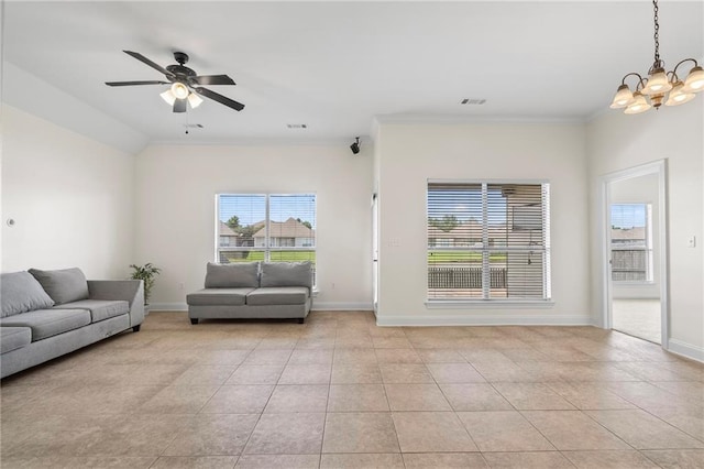 3346 Southlake Ave, Baton Rouge, LA 70818 - living room featuring a chandelier, light tile patterned floors, crown molding, a ceiling fan, and baseboards