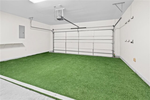 3346 Southlake Ave, Baton Rouge, LA 70818 - garage featuring a garage door opener and electric panel