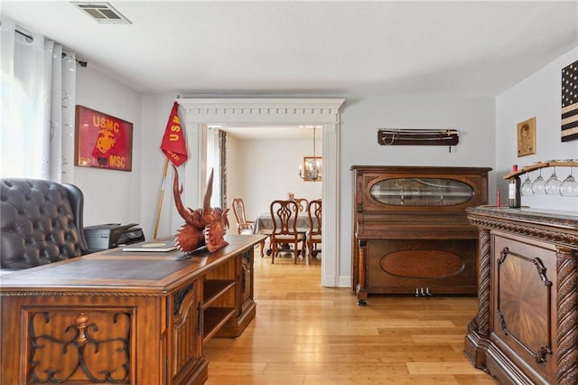 41 Yellowstone Dr, New Orleans, LA 70131 - office with a chandelier and light wood-style flooring