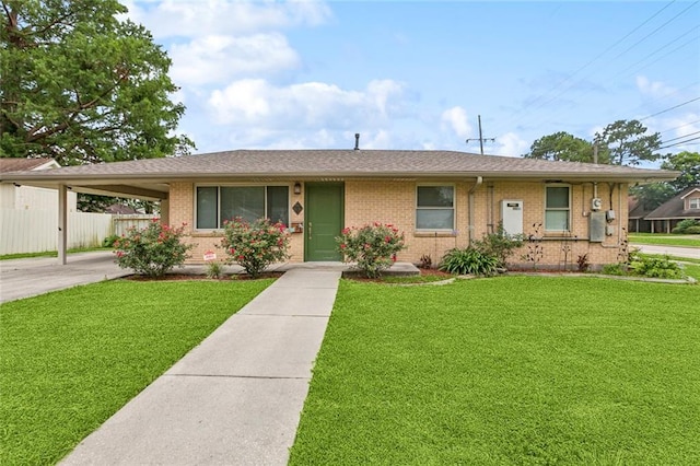38 Gretna Blvd, Gretna, LA 70053 - single story home with brick siding, an attached carport, concrete driveway, and roof with shingles
