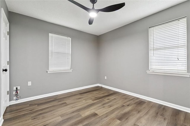 38 Gretna Blvd, Gretna, LA 70053 - unfurnished room with ceiling fan, wood finished floors, and baseboards