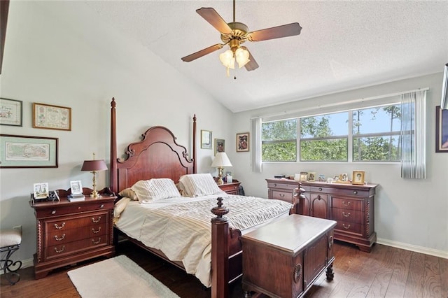 585 Beau Chene Dr, Mandeville, LA 70471 - bedroom featuring vaulted ceiling, dark wood-style flooring, baseboards, ceiling fan, and a textured ceiling