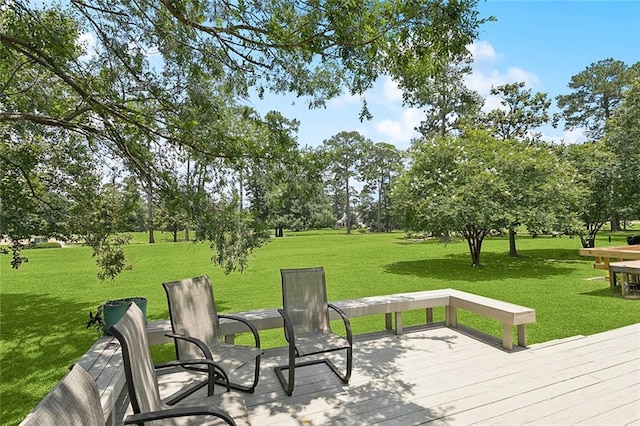 585 Beau Chene Dr, Mandeville, LA 70471 - wooden deck with a lawn