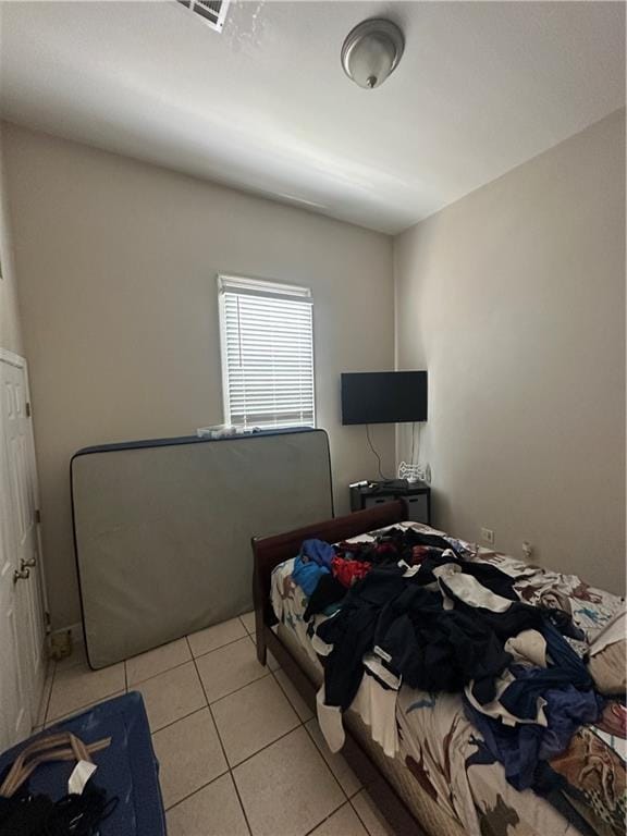 33537 Elmira Ave, New Orleans, LA 70114 - bedroom with light tile patterned floors