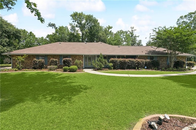 2018 Old River Rd, Slidell, LA 70461 - single story home with a front yard and brick siding