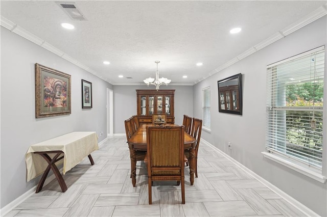 2018 Old River Rd, Slidell, LA 70461 - dining room with baseboards, a chandelier, recessed lighting, ornamental molding, and a textured ceiling