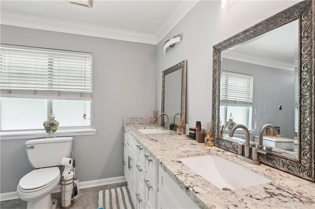 2018 Old River Rd, Slidell, LA 70461 - bathroom with double vanity, toilet, ornamental molding, tile patterned floors, and baseboards