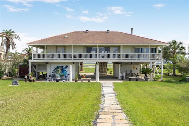 329 Carr Dr, Slidell, LA 70458 - rear view of property featuring stairway, a yard, a patio area, and a shingled roof