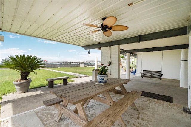 329 Carr Dr, Slidell, LA 70458 - view of patio featuring outdoor dining space and a ceiling fan