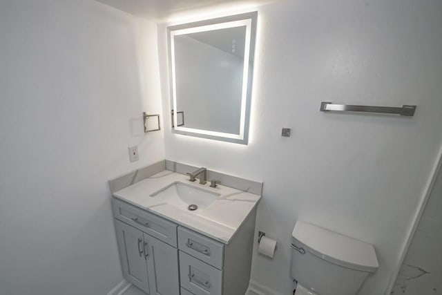 2500 Houma Blvd Unit 202, Metairie, LA 70001 - bathroom featuring vanity, toilet, and baseboards