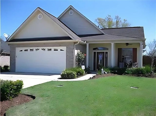246 Betty Dr, Montz, LA 70068 - view of front of home with a garage, a front lawn, driveway, and a porch