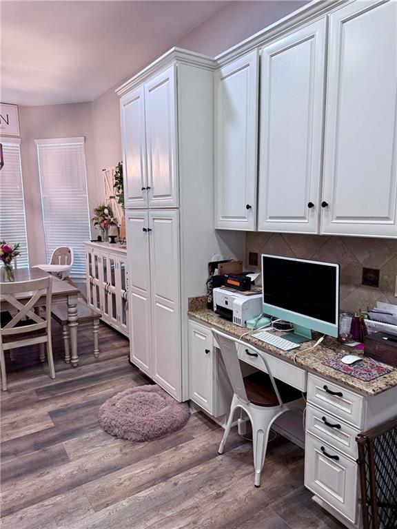 246 Betty Dr, Montz, LA 70068 - office space with dark wood finished floors and built in study area